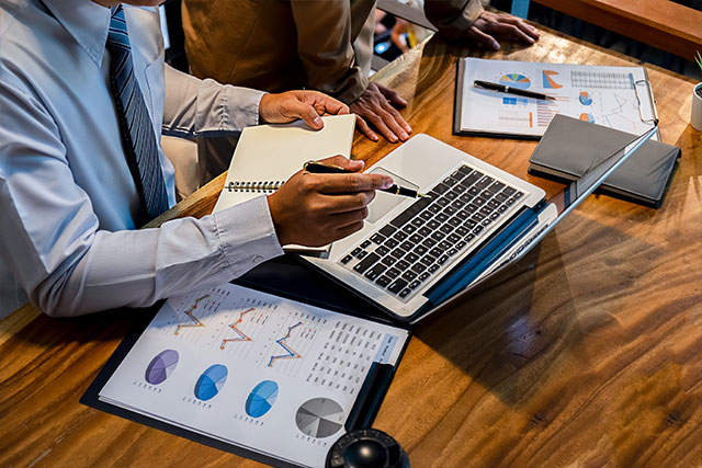 Administrator business man financial inspector and secretary making report calculating balance. Internal Revenue Service checking document. HR Audit and Due diligence concept