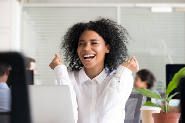 happy human resources employee in Atlanta office