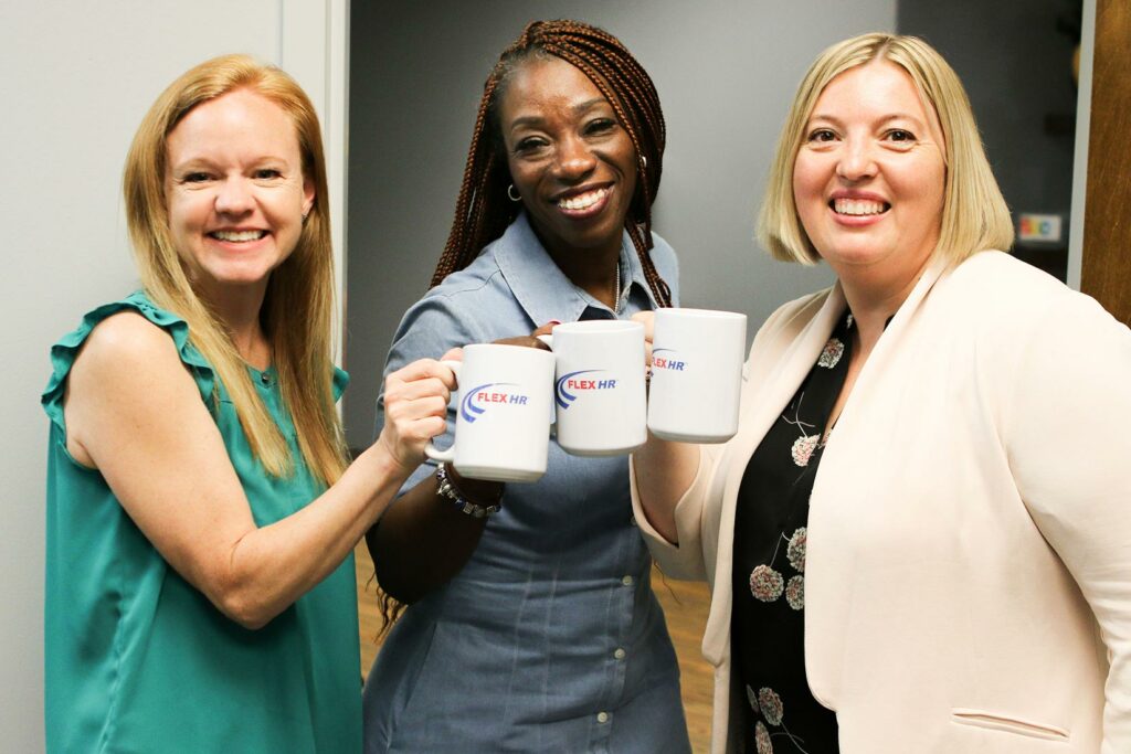 HR recruiting meeting, 2 people shaking hands and smiling